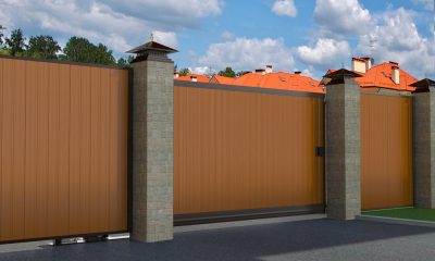 ОТКАТНЫЕ УЛИЧНЫЕ ВОРОТА В АЛЮМИНИЕВОЙ РАМЕ С ЗАПОЛНЕНИЕМ СЭНДВИЧ-ПАНЕЛЯМИ